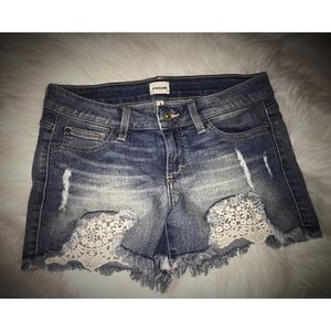 Sneak Peek Distressed Denim Shorts with Lace Accents